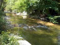 Rustico ex mulino in sassi vic.ze ruscello con terreno 3 ettari